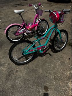 2 BIKES WITH 3 HELMETS  $110 OBO