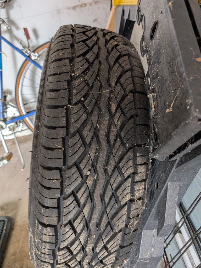 New Tire  235/70 R16