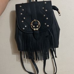 Selling cute mini backpack for 10 bucks open for offers