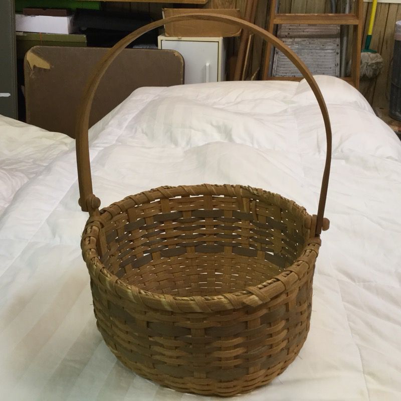 Basket with handle, approximately 12” in diameter