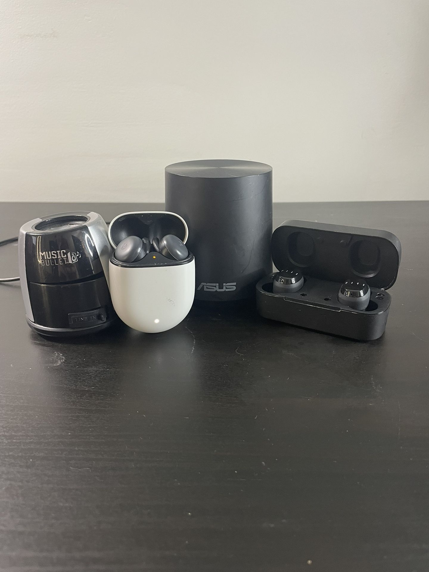 Wireless earbuds and speakers bundle