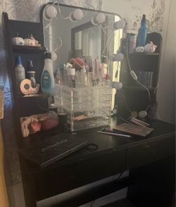 Black vanity with lights