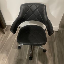 Adjustable Grey leather office chair