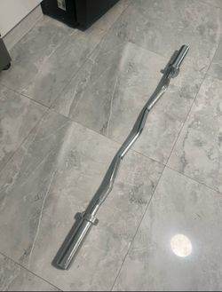 Cash only no Zelle new ez curl bar barbell for Olympic weights plates 4 foot curl bar it is not a straight bar have other gym items check my page