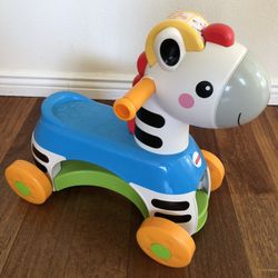 Fisher Price Rollin' Tunes Horse Ride On