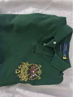 Ralph Lauren green polo shirt with embroidered design.