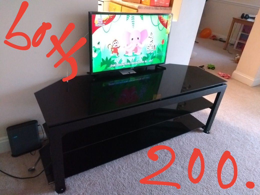 Full glass TV stand and Samsung smart TV