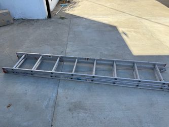 Title: Werner Aluminum Extension Ladder – Used 15ft