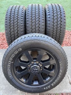 Dodge Ram 2500 Stokc rims on 285/60/20 like new tires 500 milles only 