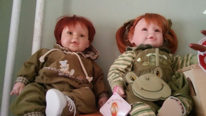 Vinyl collective dolls