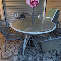 Patio Table and 4 Metal Chairs 