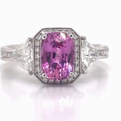 Pink Sapphire & Diamond Ring in 18K White Gold 💎🥰 A beautiful 1.57 carat cushion cut pink sapphire sits at the center of this enchanting Simon G. se