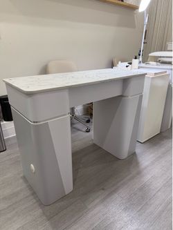 2 nail tables ($600)