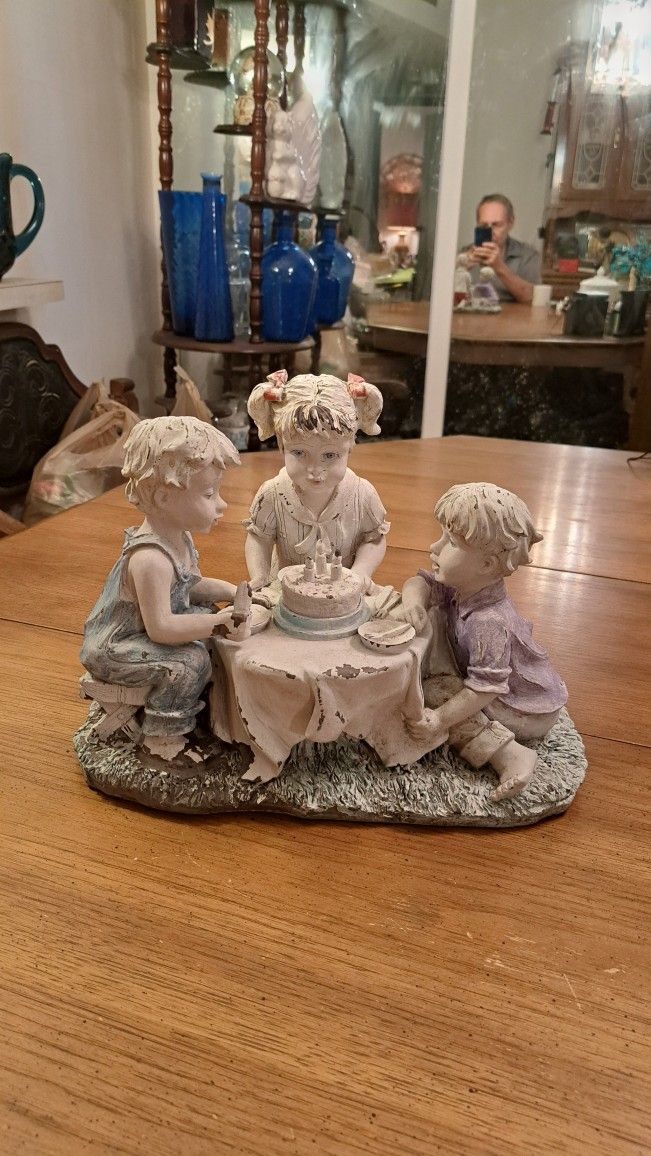 Lovely Vintage Garden Decor Of 3 Children Having A Birthday Party In The Yard 12"L X 9"W X 9"H Some Paint Worn Off Due To Age See Pics 