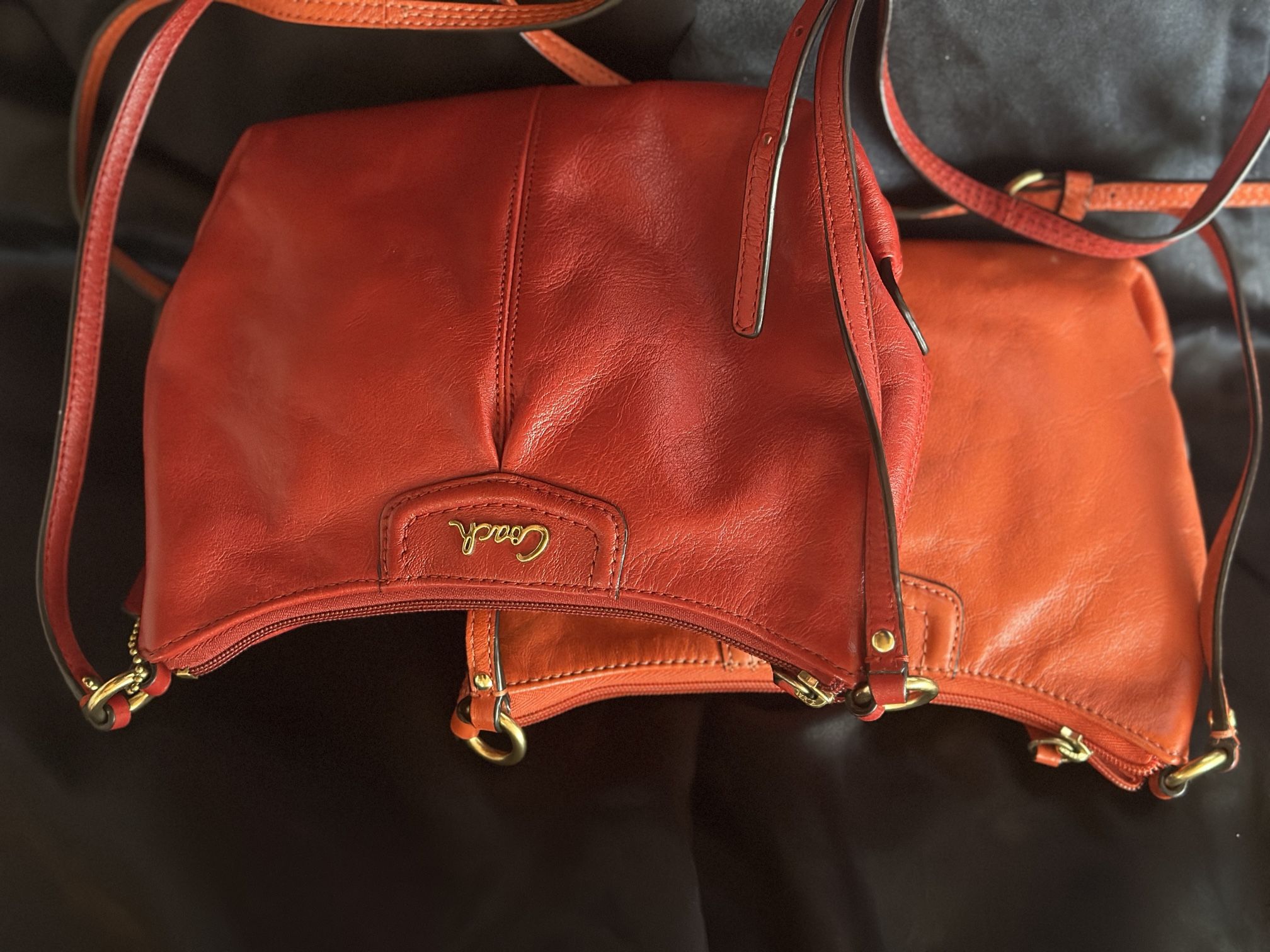 Red/Peach/Coral leather Coach Saddle bag
