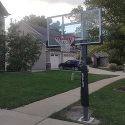 Goaliath 54 inch in ground basketball hoop, adjustable basketball court