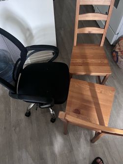 2 kitchen chairs and 1 computer