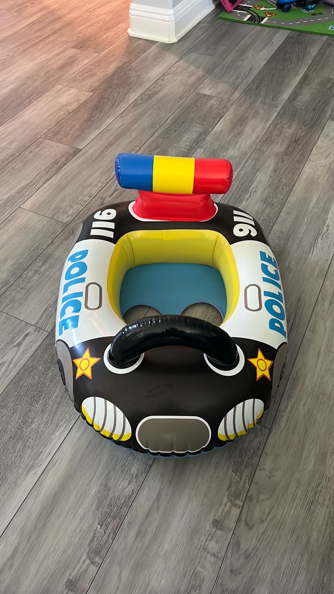 Toddler police swim float