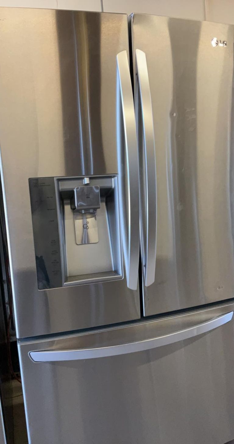 LG 3 Door Stainless Steel Refrigerator 33" Wide With Water and Ice maker