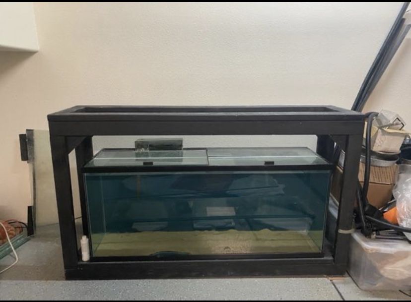 110 gallon aquarium , with custom stand and filter.