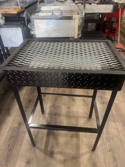 Asador de carbón
