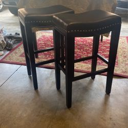 Two Brown High Stools