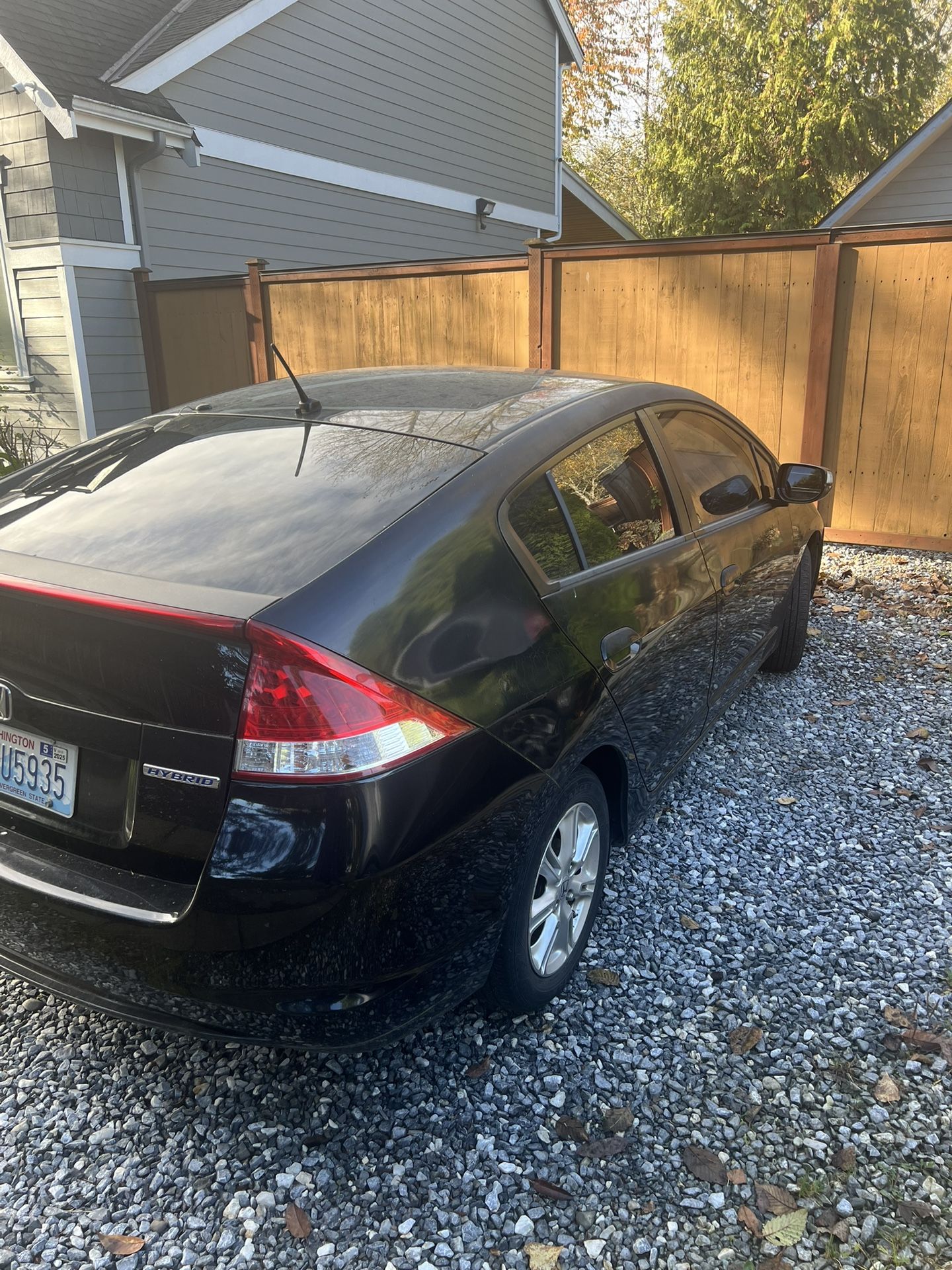 2010 Honda Insight hybrid, great on gas. Exterior is black, Interior is light gray. Runs and drives ! Currently has 169199 miles.