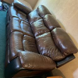 Clean Comfy Couch. Both Ends are Recliners. 