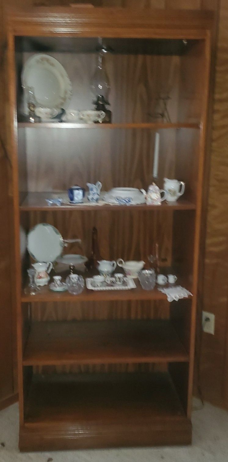 Beautiful wooden display cabinet with shelves, Has Light, perfect for showcasing your favorite collectibles, china, or decorative items
