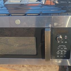 GE stainless steel over-the-range microwave oven