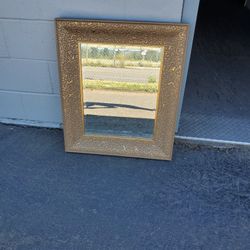 Large Beveled Gold Mirror With Vine Motifs