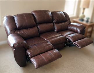 Leather sofa with end recliners