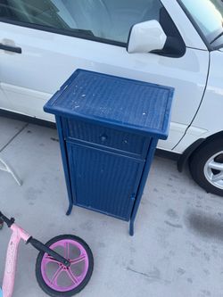 Blue wicker bathroom cabinet