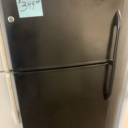 Black GE Refrigerator  Ex Large Excellent  33” .  Warranty  . Delivery Available . 2203 Fowler St. 33901