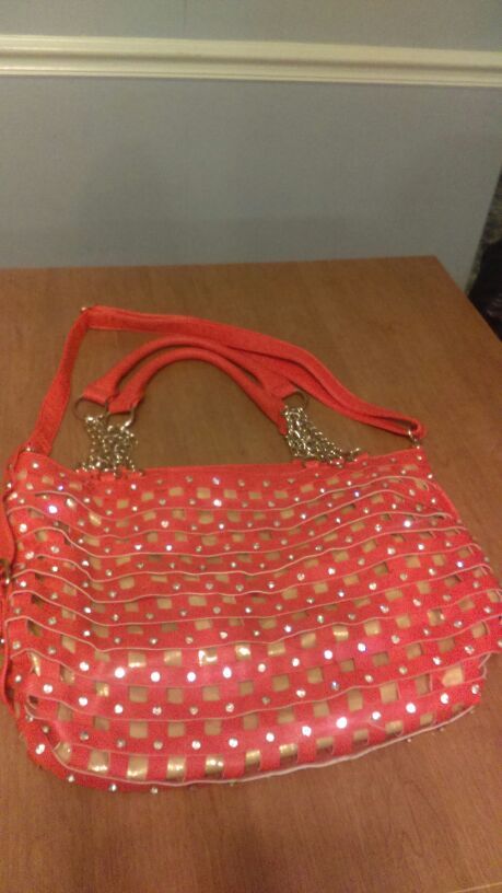 Clemson fans orange purse paid 300.00