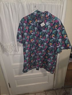 Brook Taverner
Blue with Leopard and Jungle Print Tropical Short Sleeve Shirt