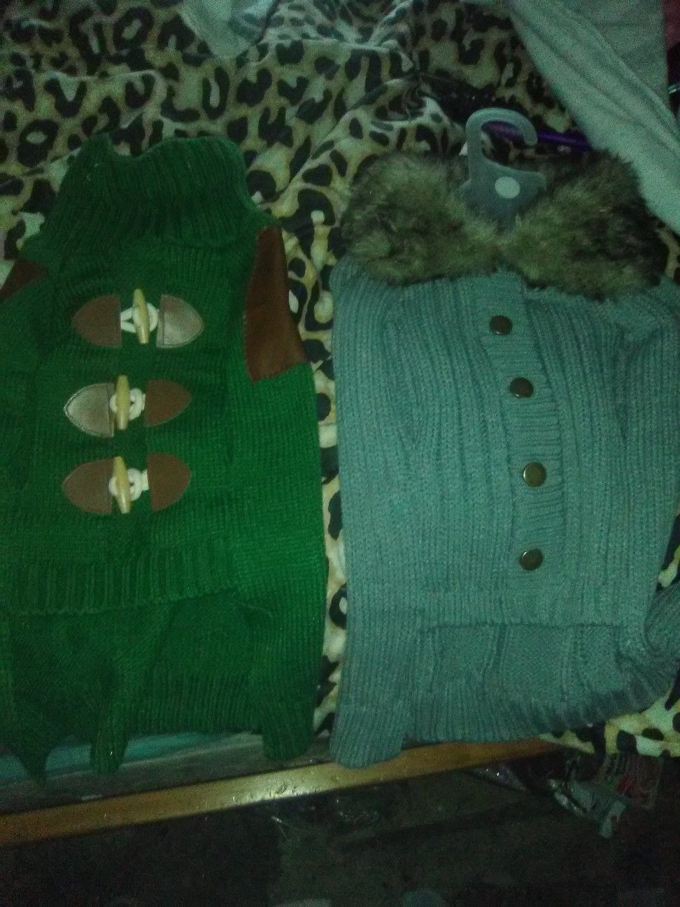 A mixed collection of Dog sweaters