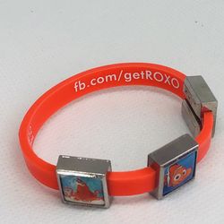 ROXO bracelet with three charms in pink color