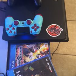 PS4 Slim with 2 controllers and 2 games