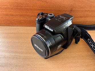 Beautiful Nikon COOLPIX P100 10.3MP Digital Camera 26x Zoom