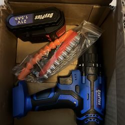 21 volt Cordless drill with battery and attachments