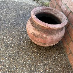Nice Decorative terracotta pot with a rustic finish.
