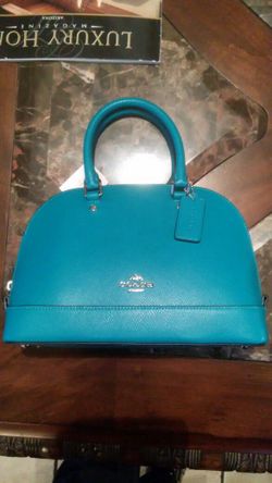 BOLSOS COACH