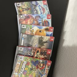 Yellow Nintendo light switch w games