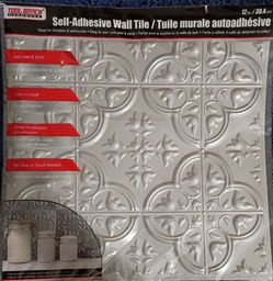 Self adhesive wall tile