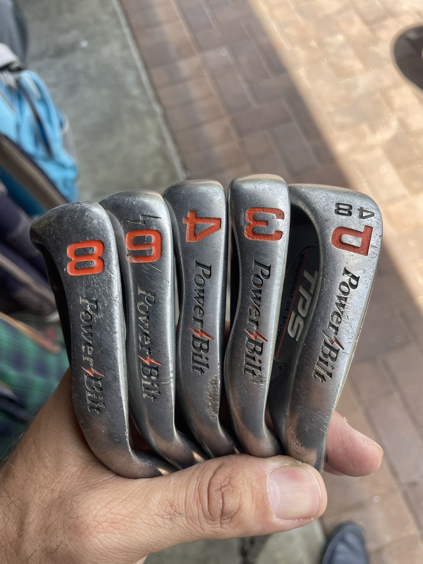 Powerbilt TPS Irons In Right Hand