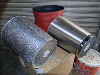2 stainless steel waste paper basket and one planter box