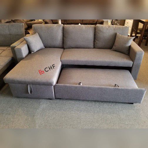 Living room sectional sofa with storage chaise and pull out bed