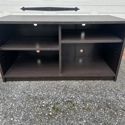 Brown Entertainment Center With Adjustable Shelves 