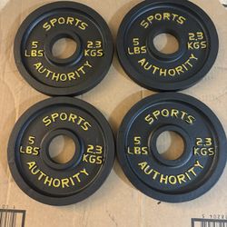 Four 5lb Olympic Plates 